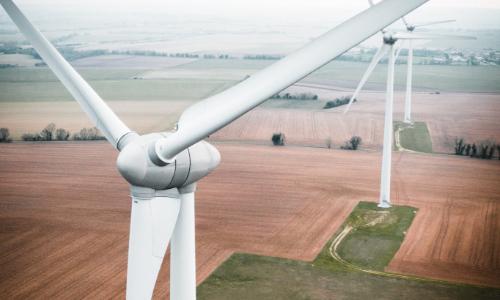 Photo of Wind Turbines in Fields