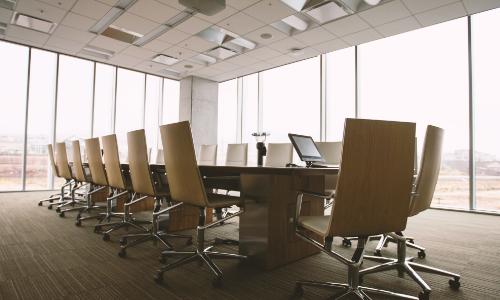 Photo of an empty well lit meeting room